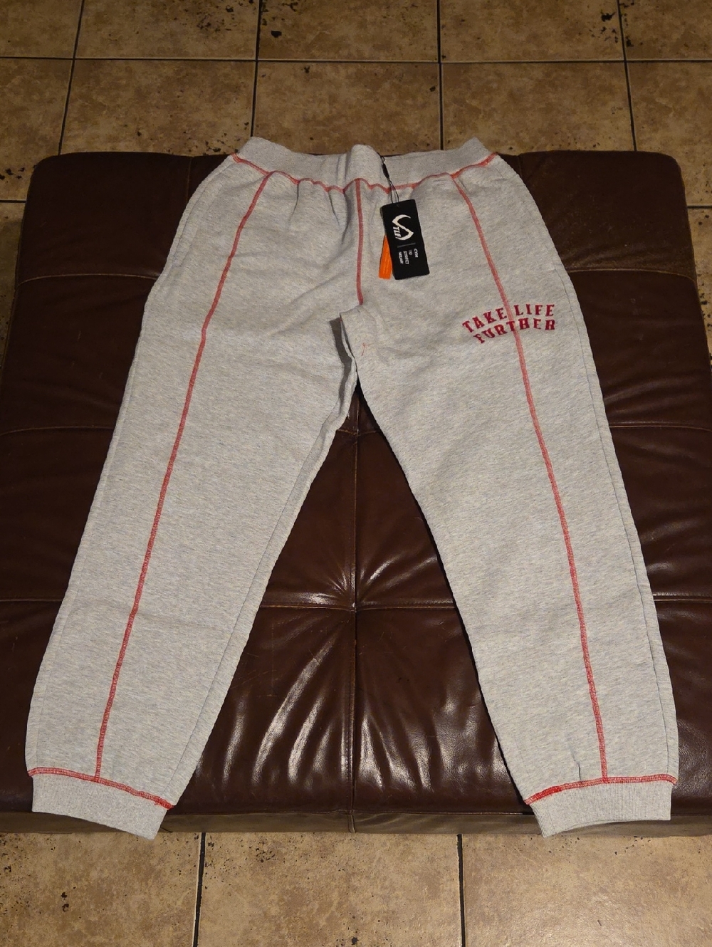 TLF Gray Sweatpants and 'Take Life Together' Detail With Zipper Pockets